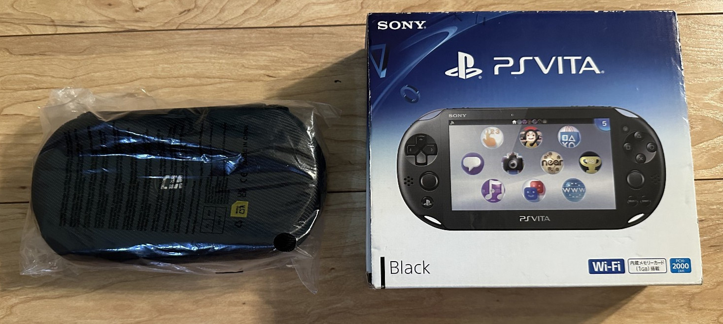 Sony PS Vita PCH-2000 1GB Black JP – Excellent. Orig Box + 8GB MC + 128GB mSD