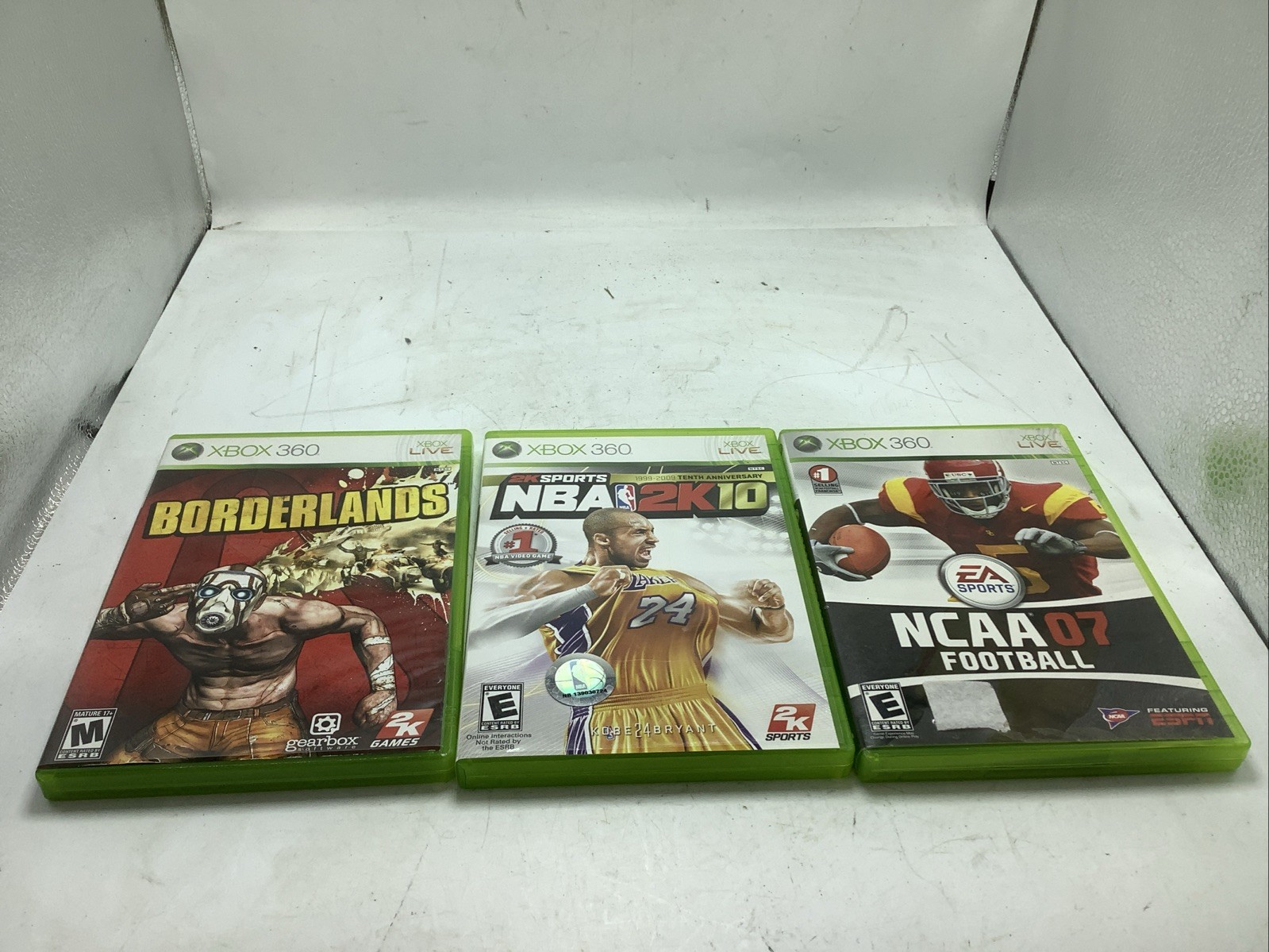 Lot of 3 Xbox 360 Games NBZ 2K10 NCAA 07 FOOTBALL BORDERLANDS TESTED
