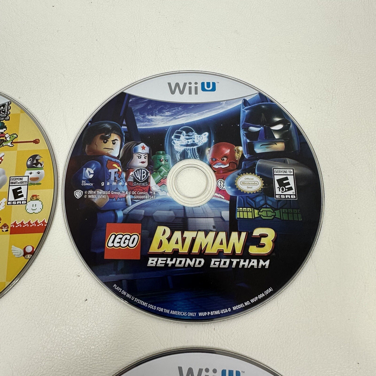Wiiu Wii lot of 4 games Mario Maker Lego Batman Boom Blox Disney Infinity