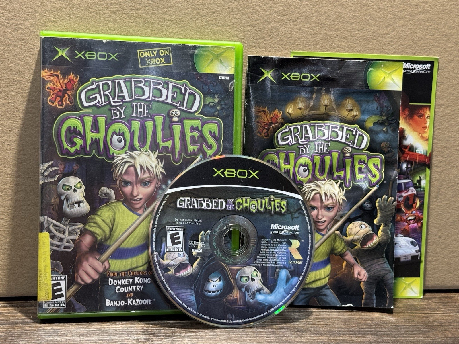 Grabbed by the Ghoulies (Microsoft Xbox, 2003) CIB Complete In Box w/ Manual