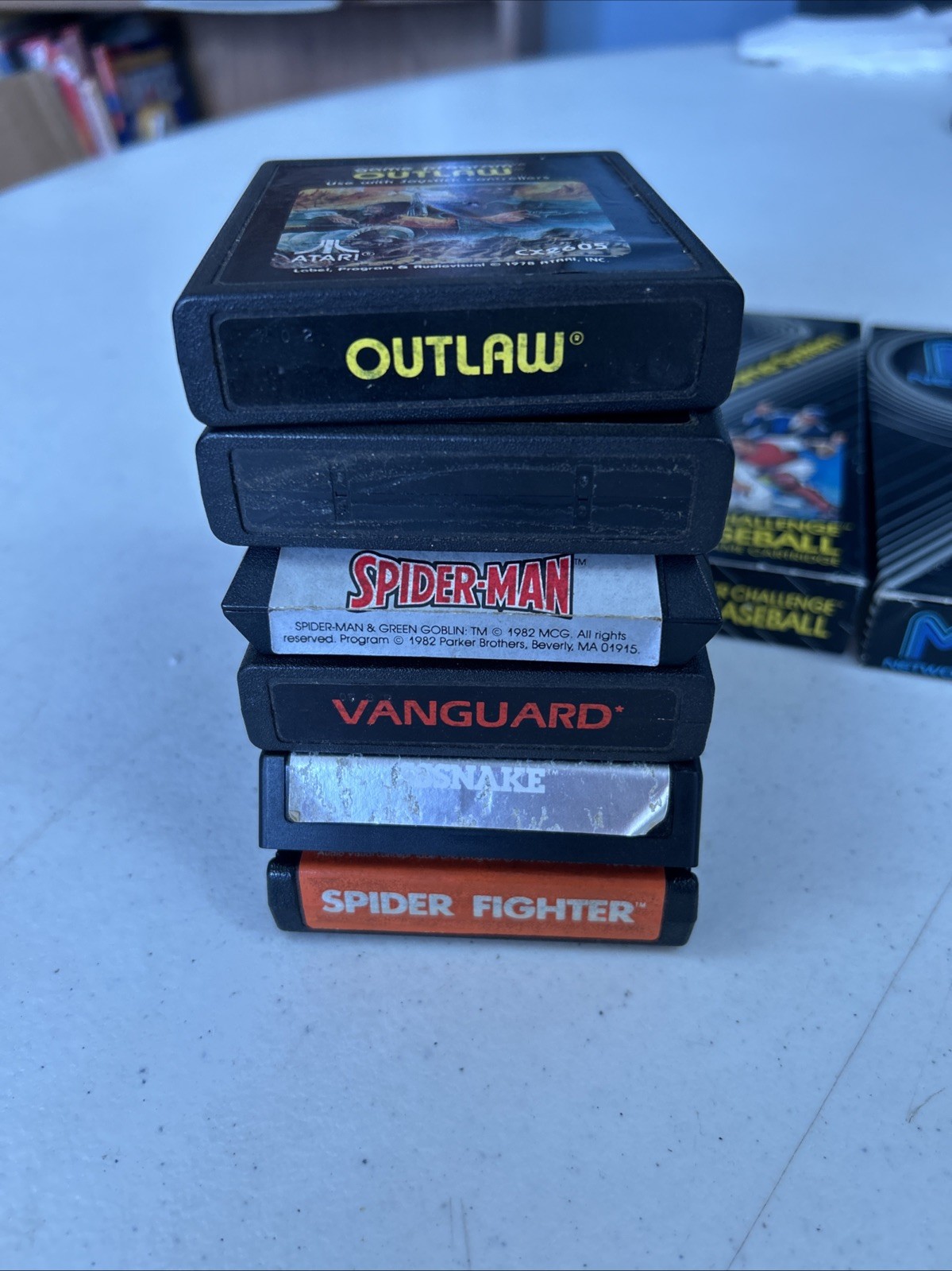 Lot Of 8 Atari 2600 Video Games Vintage Spider-Man Astroblast Sssnake Outlaw