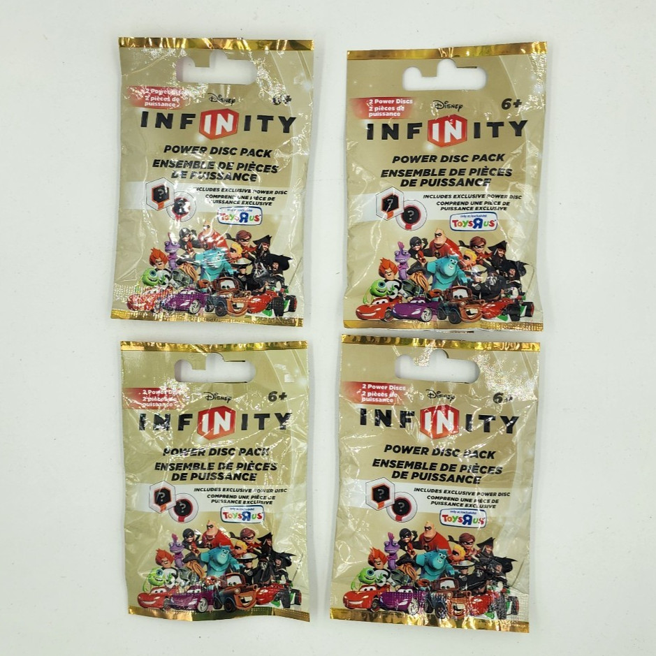 Lot of 4, Disney INFINITY Power Disc Packs GOLD Edition Blind Bags *sealed