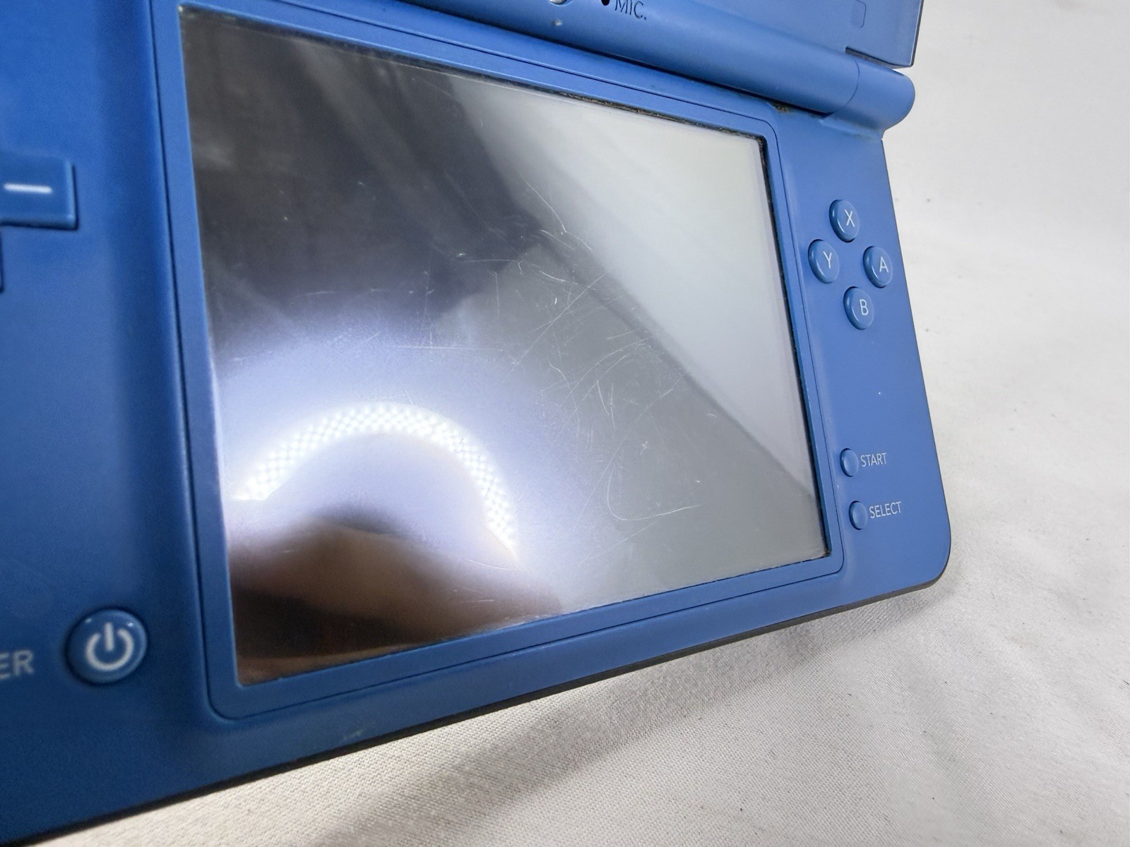 Nintendo DSi XL Handheld Game Console UTL-001 Midnight Blue, 5 Games & Charger