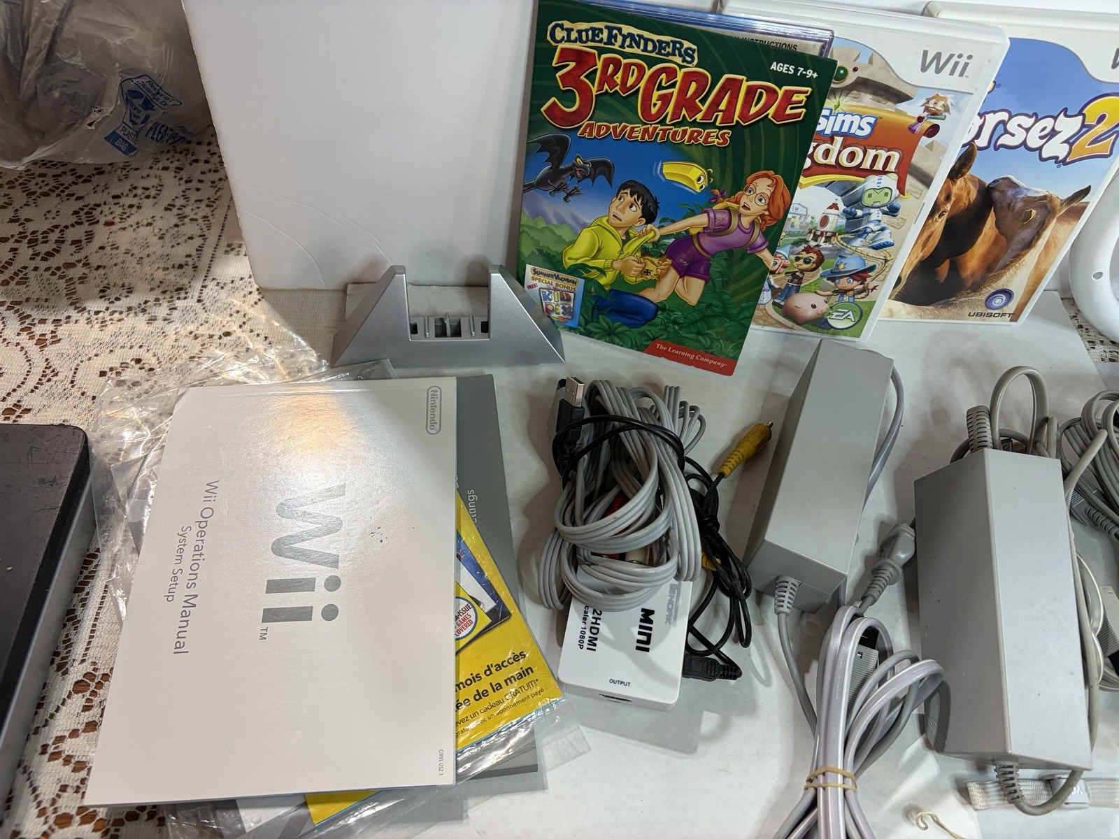 Wii video game console bundle with multiple accessories and games (untested)