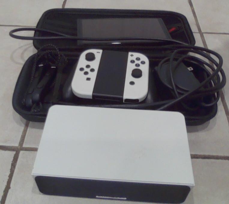 Nintendo Switch OLED Model – 64GB/White) comes with joysticks and case