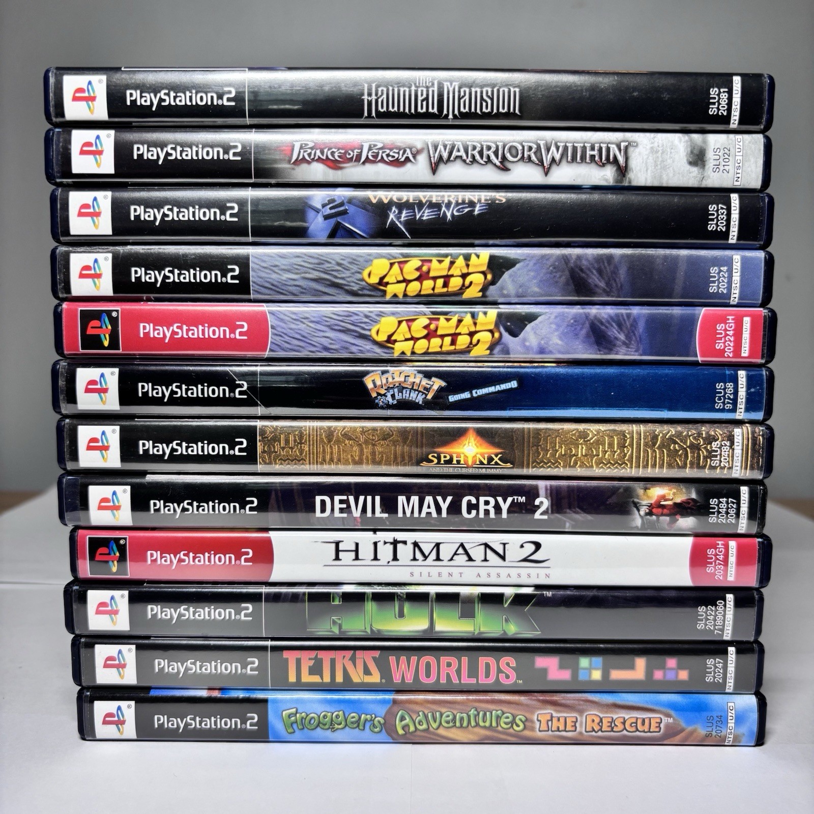 12 PlayStation 2 PS2 Games CIB Tested Lot Ratchet Sphinx Pac-Man Haunted Mansion