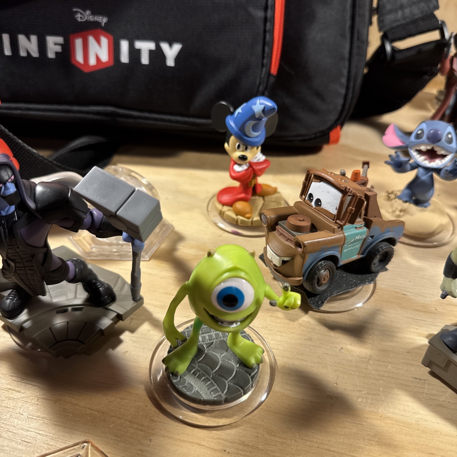 Disney Infinity Figure Lot Of 21 With Travel Bag And Discs Monsters Stitch Ralph
