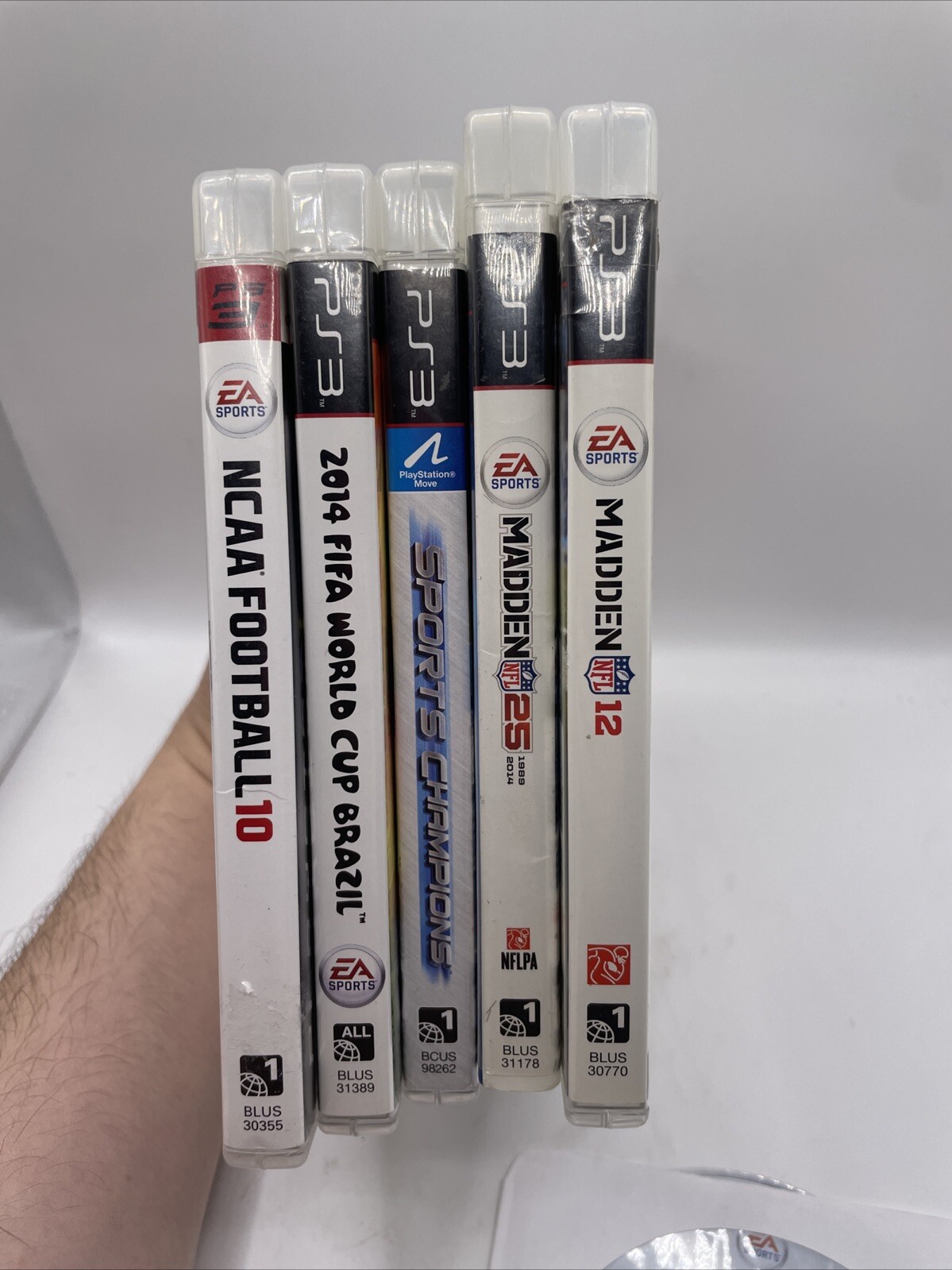 PS3 Lot Of 6- Madden 12,25/NCAA Football 10,12/Brazil Soccer 2014 & Sports Champ