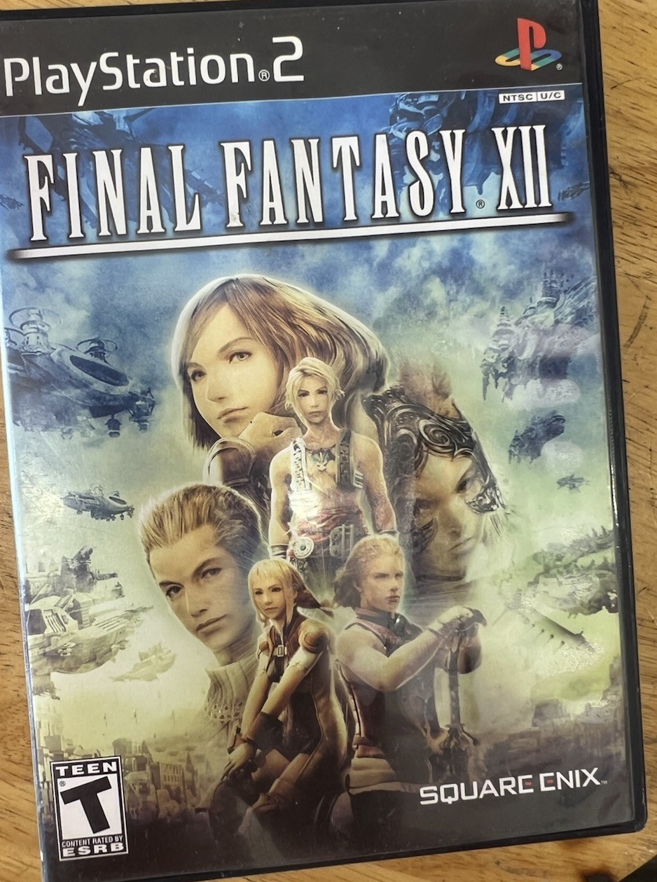Square Enix Final Fantasy XII 2006 Teen Version Sony PlayStation W/ Book