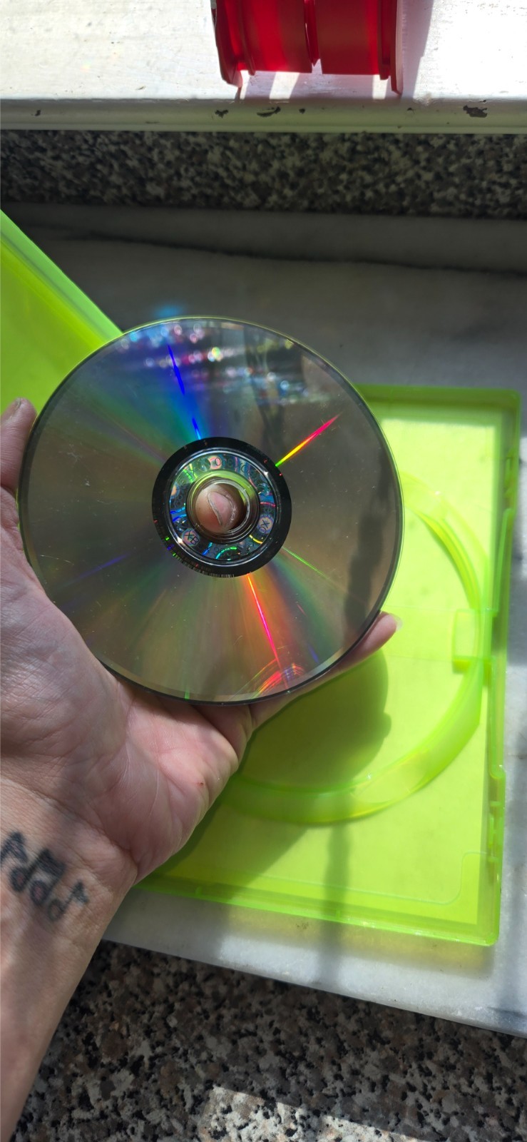 pre-owned copy of the video game Dead Island: Riptide for the Xbox 360 platform