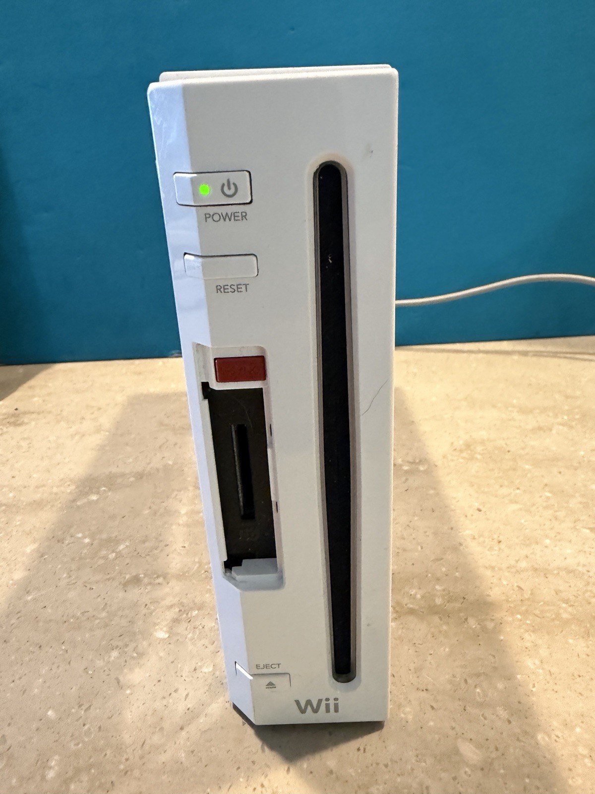 Original Nintendo Wii Bundle- Consol, Wii Sports, Game Party 2, And Controllers.