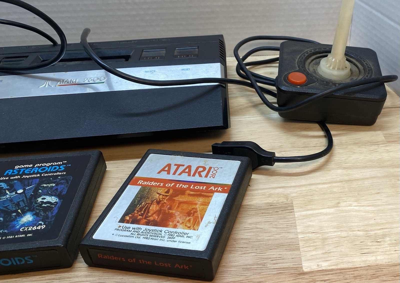 Atari 2600 Console with Games Asteroids ET Raiders of the Lost Ark