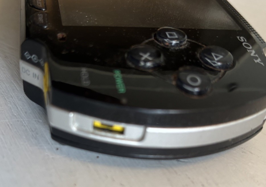 Sony PSP Console Only PSP-1001 Handheld For Parts Or Repair. Read- With Charger