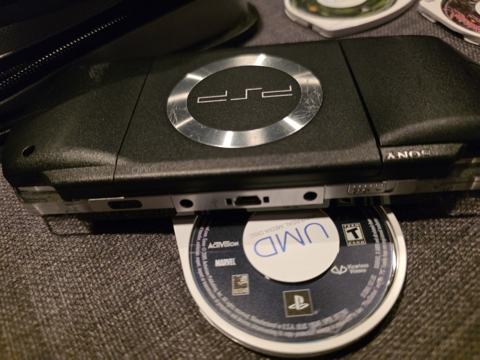 Sony PSP-1001 Black, Oem Charger, 5 Games – Darkstalkers, Xmen, Twisted Metal