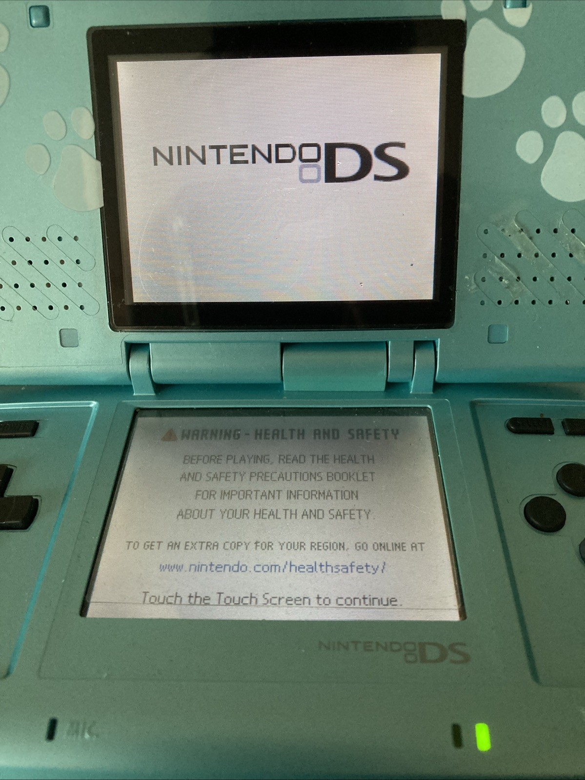 Nintendo DS Handheld System with DS and GBA Games Bundle