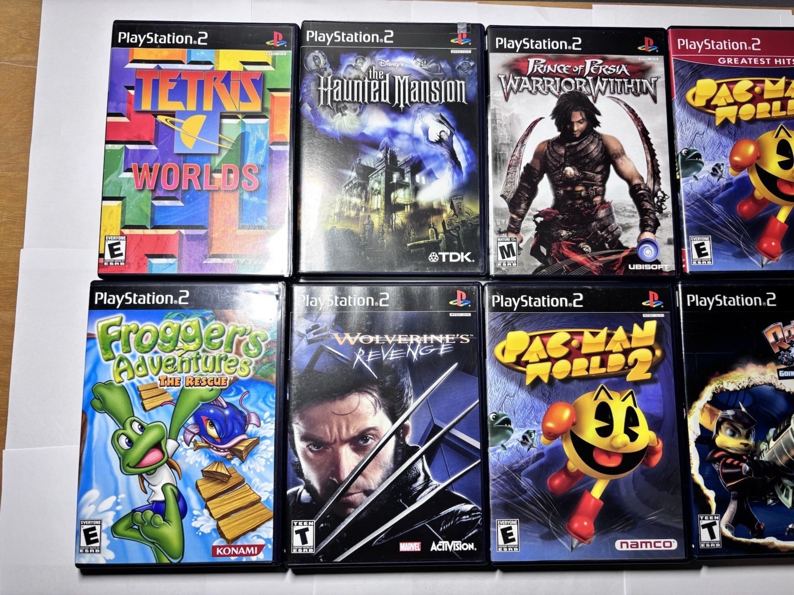 12 PlayStation 2 PS2 Games CIB Tested Lot Ratchet Sphinx Pac-Man Haunted Mansion