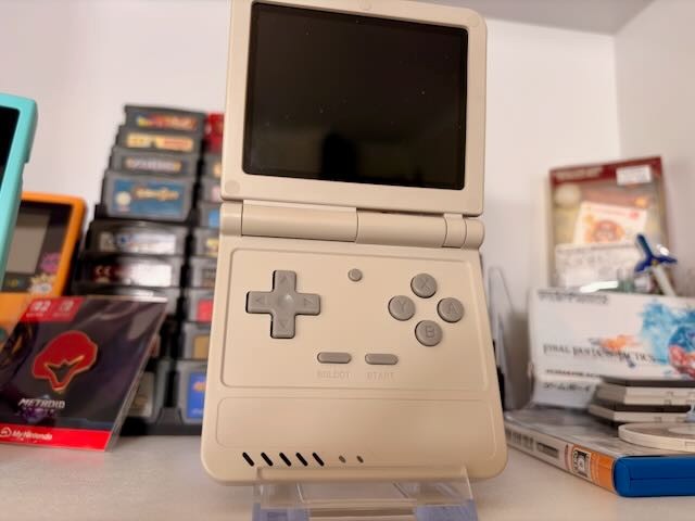 Powkiddy V90S Clamshell Retro Handheld Game Console – Sleek Grey Finish