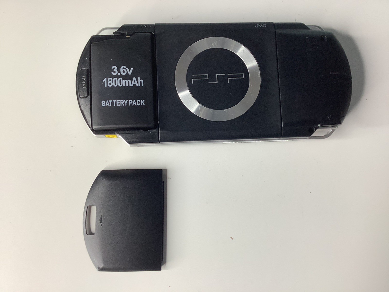 Sony PSP Console Only PSP-1001 Handheld W/ Battery NOT WORKING RIGHT TURNS ON