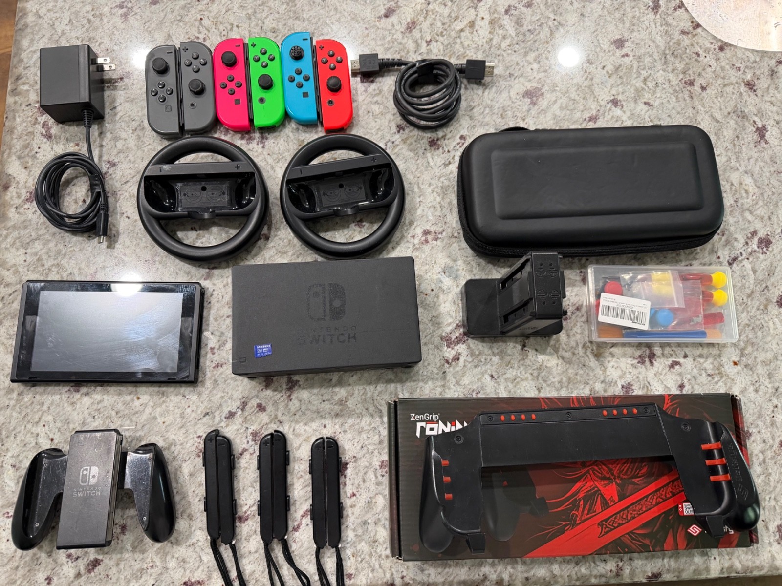 Nintendo switch bundle with satisfye grip and 256GB micro sd card and case