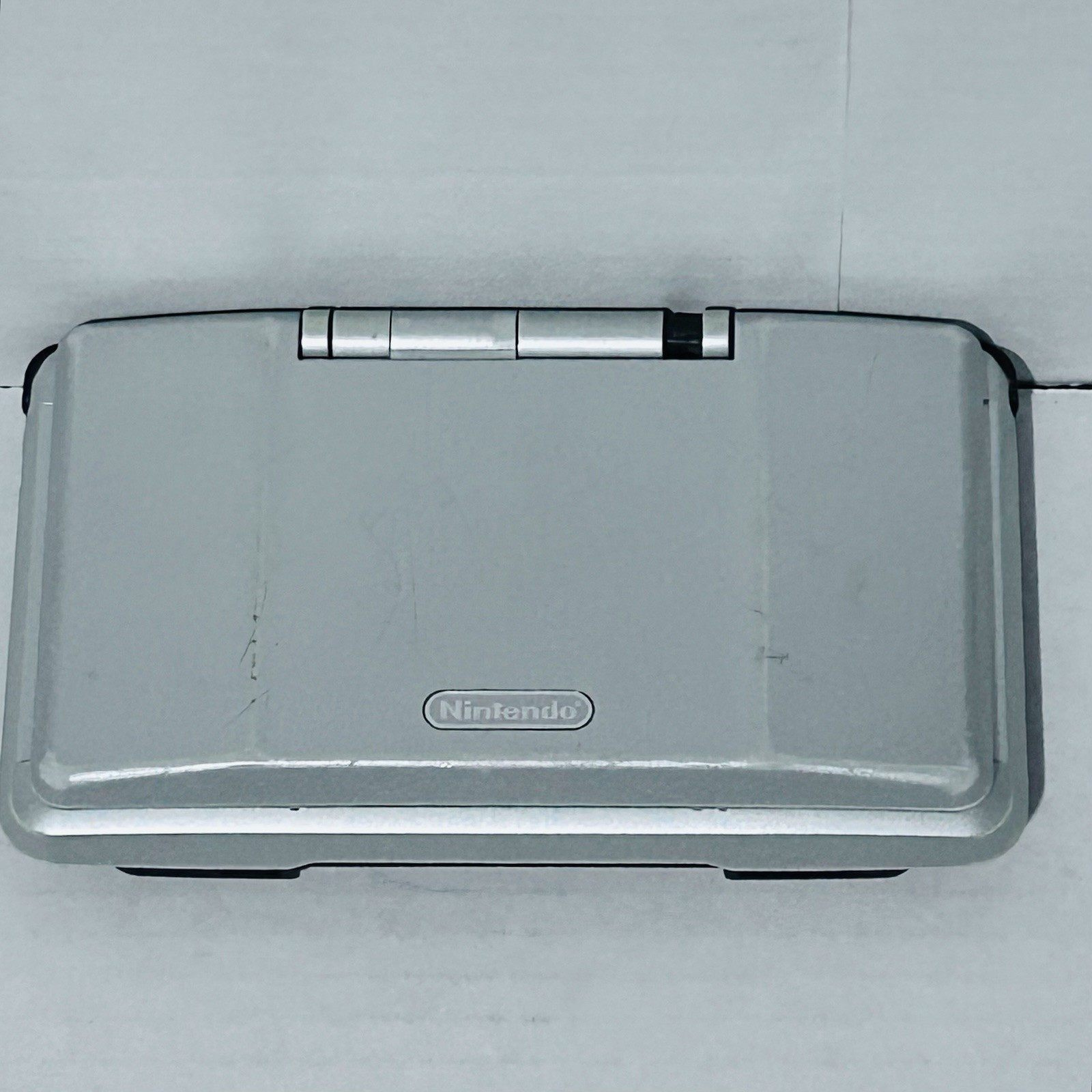 Nintendo DS NTR-001 Original Silver has Broken Hinge FOR PARTS OR REPAIR AS-IS