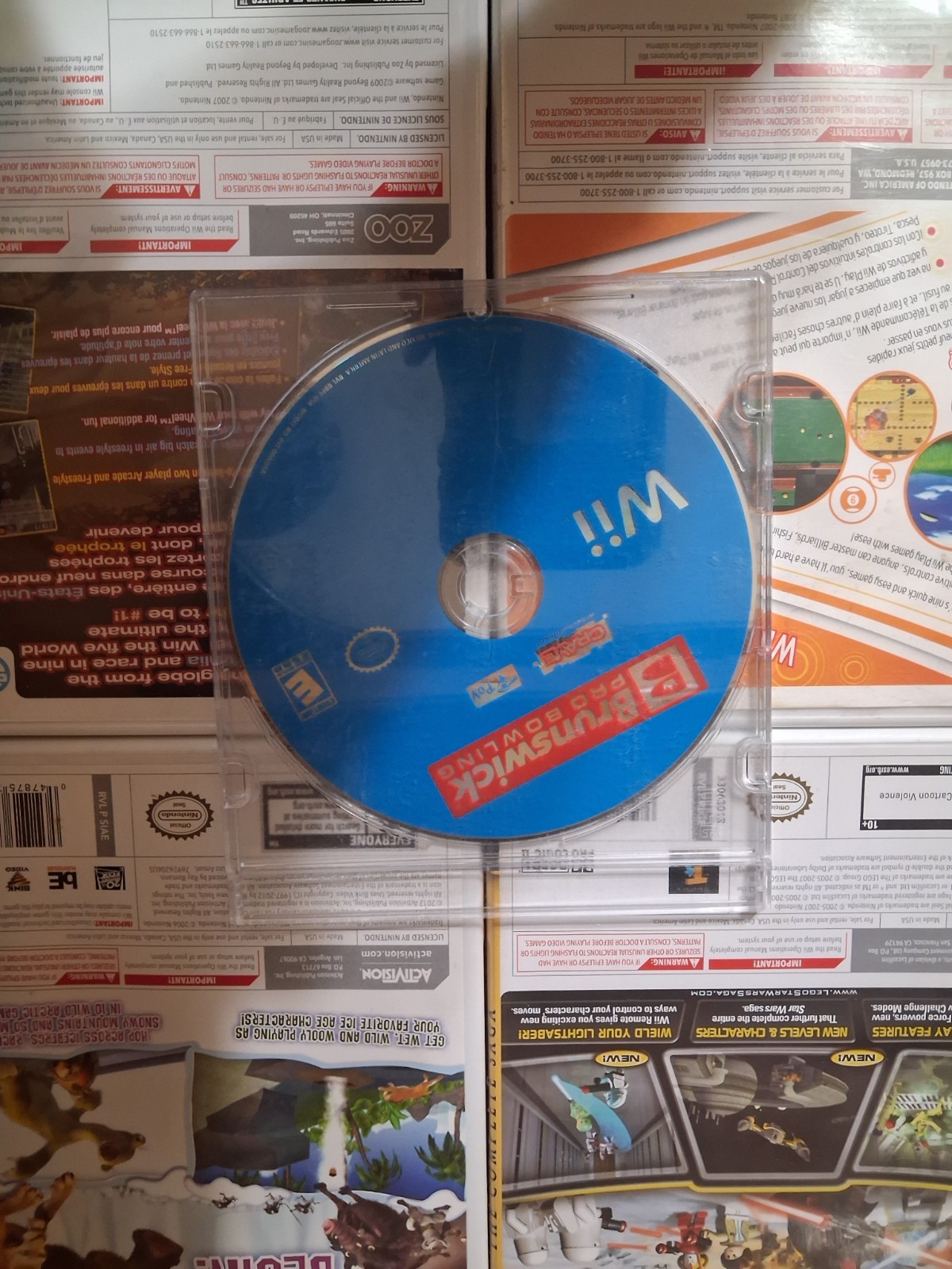 Nintendo Wii Game Lot: Ice Age, Wii Play, LEGO Star Wars, ATV Quad Kings & more.