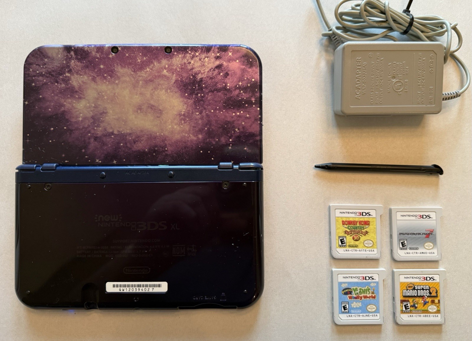Nintendo New 3DS XL Galaxy Style Bundle w/ Charger Stylus & 4 Games Tested