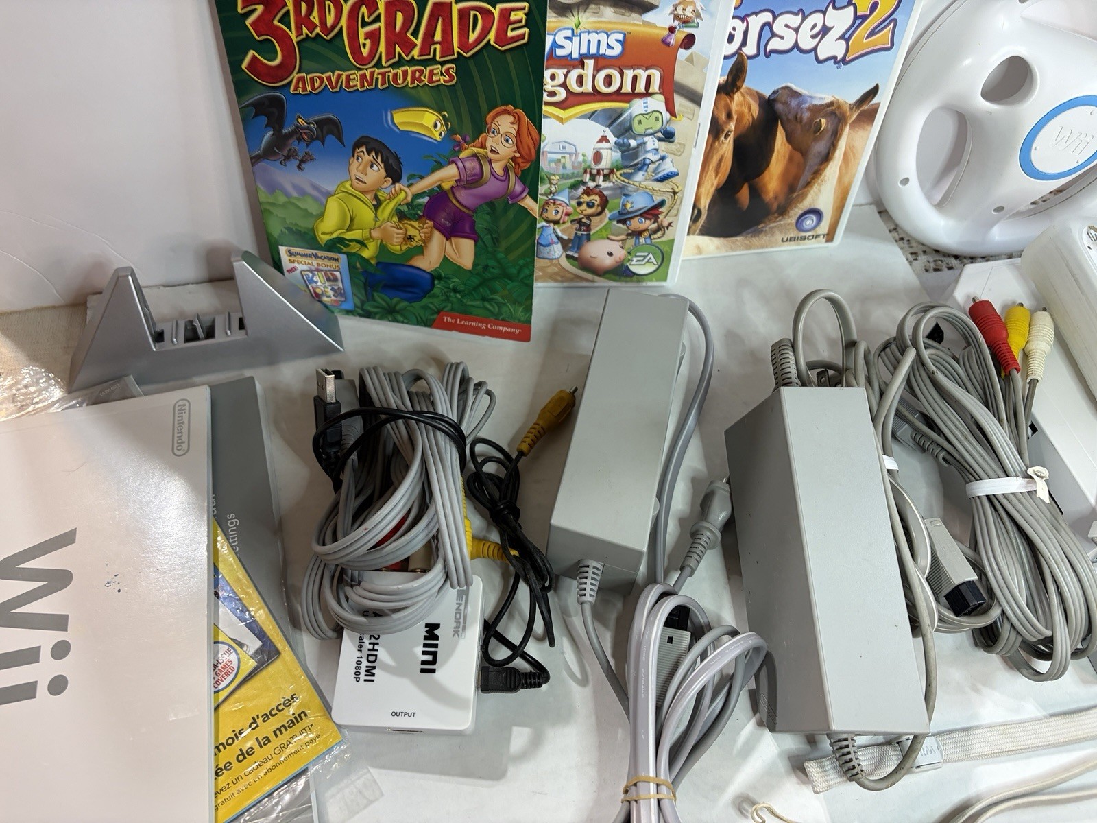 Wii video game console bundle with multiple accessories and games (untested)