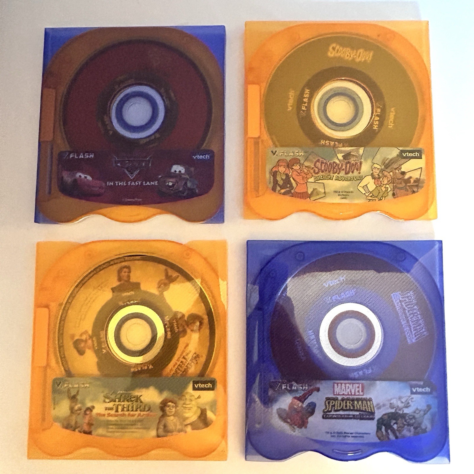 Vtech V.Flash Video Game Lot (4) Scooby-Doo, Cars, Spider-Man, Shrek the Third