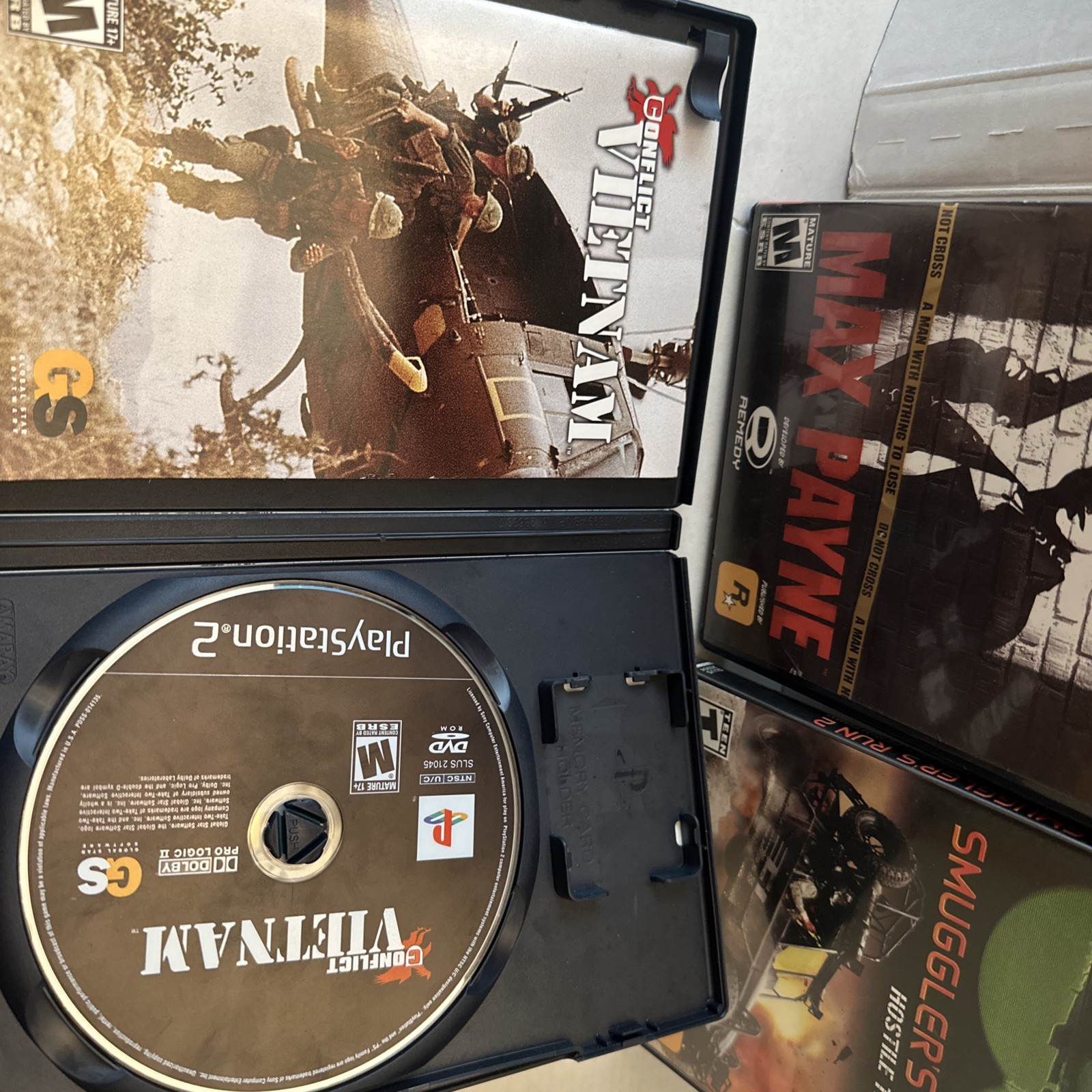Lot Of 3 PS2 Smugglers Run 2, Max Payne , Conflict Vietnam W/manuals Not Tested
