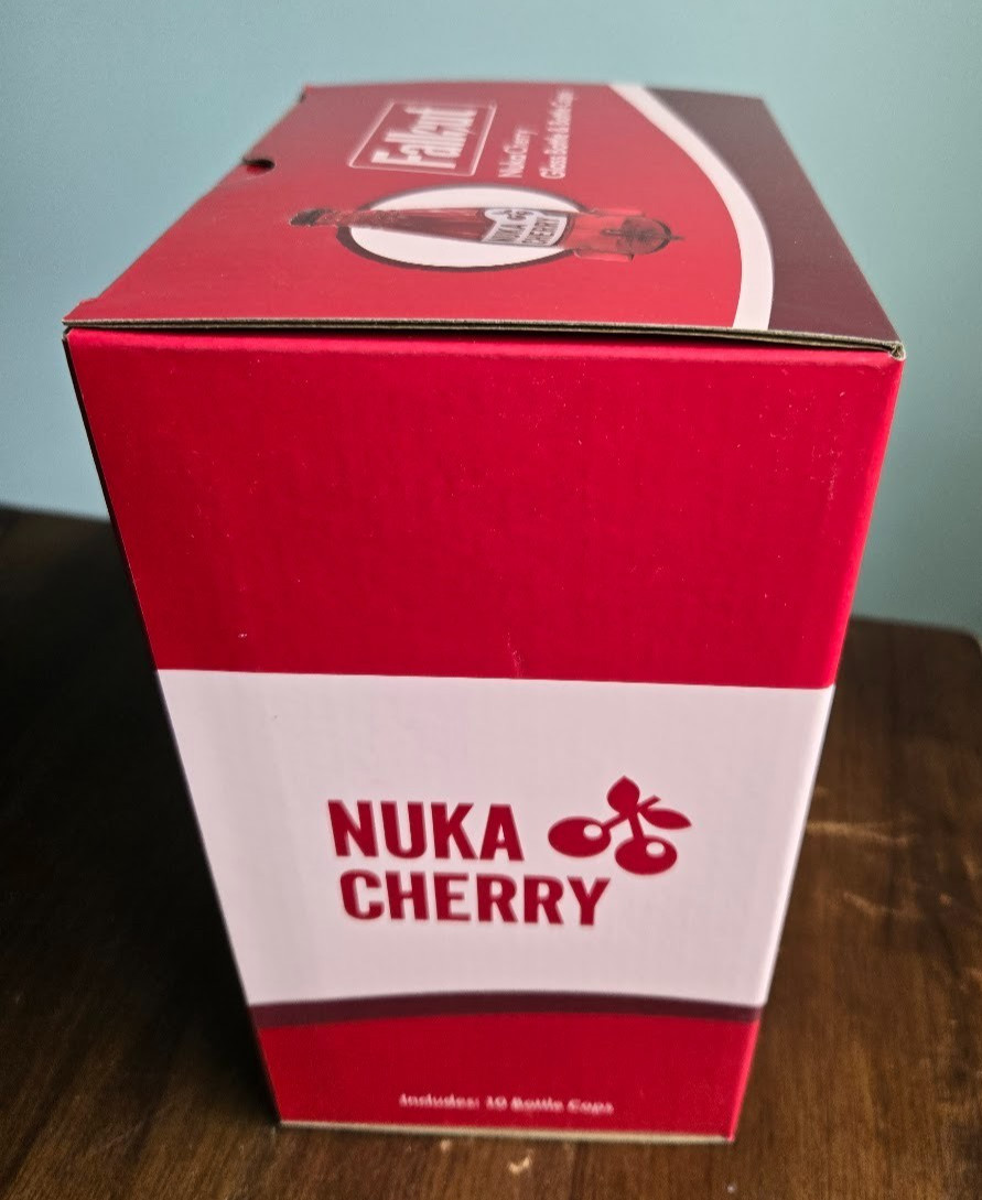 Fallout Nuka Cola Cherry Glass Rocket Bottle & 10 Bottle Caps NEW