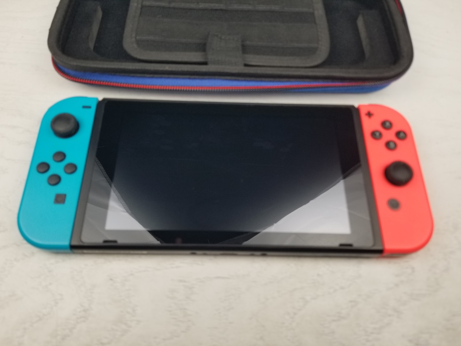Nintendo Switch with Neon Blue and Neon Red Joy-Con (HAC-001-01) With Case