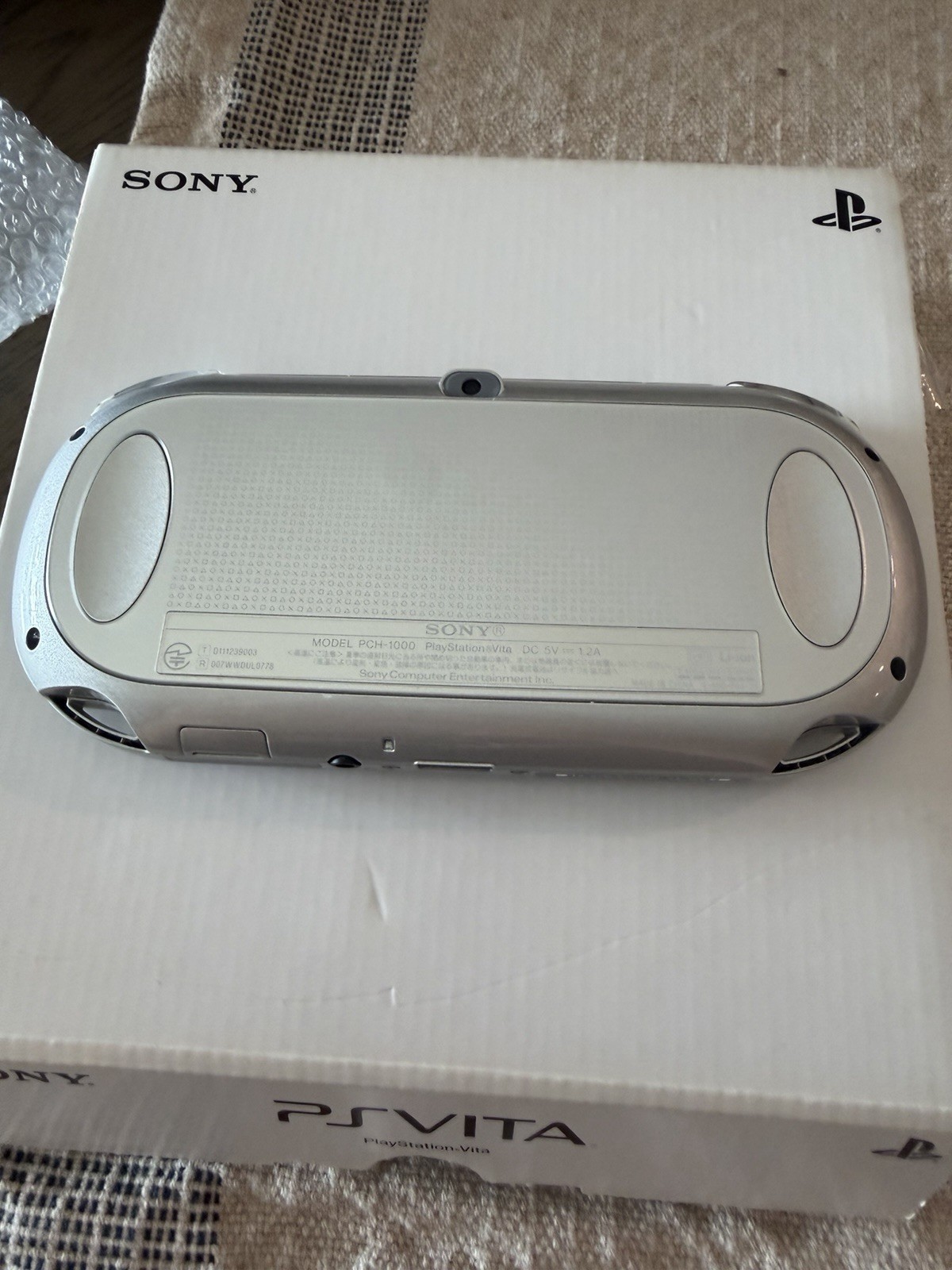 MINT Sony PS Vita PCH-1000 OLED SILVER with box