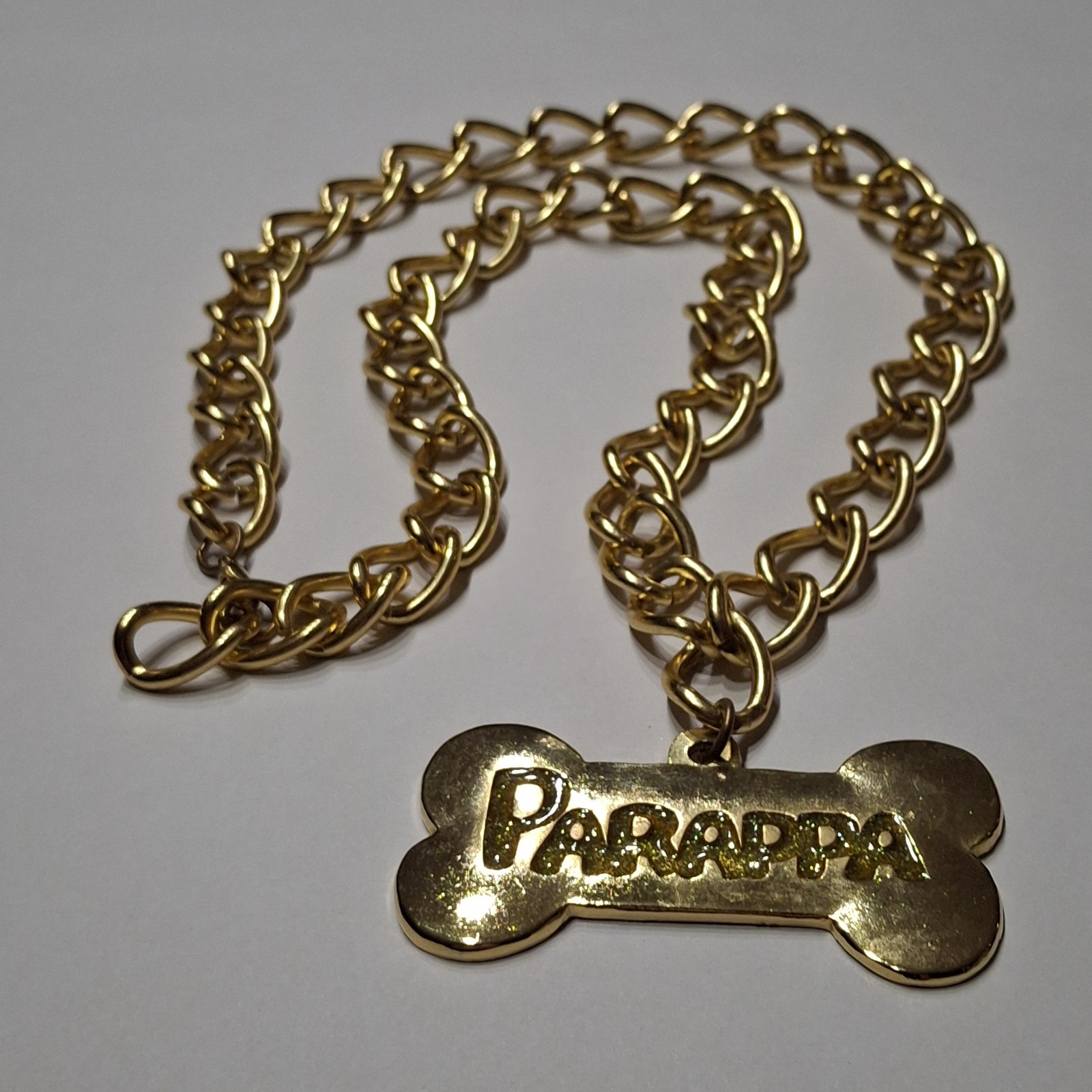 Official SCEA PaRappa The Rapper Promo Set: Red Beanie & Gold Colored Bone Chain