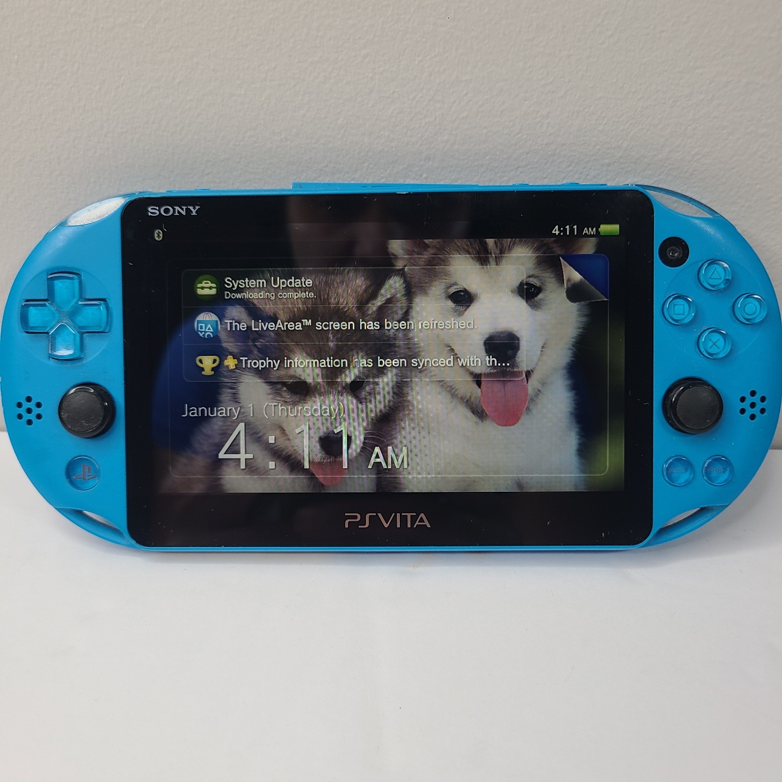 Sony PS Vita PCH 2000 ZA23 Aqua Blue Slim Console W/ LEGO Jurassic World Game
