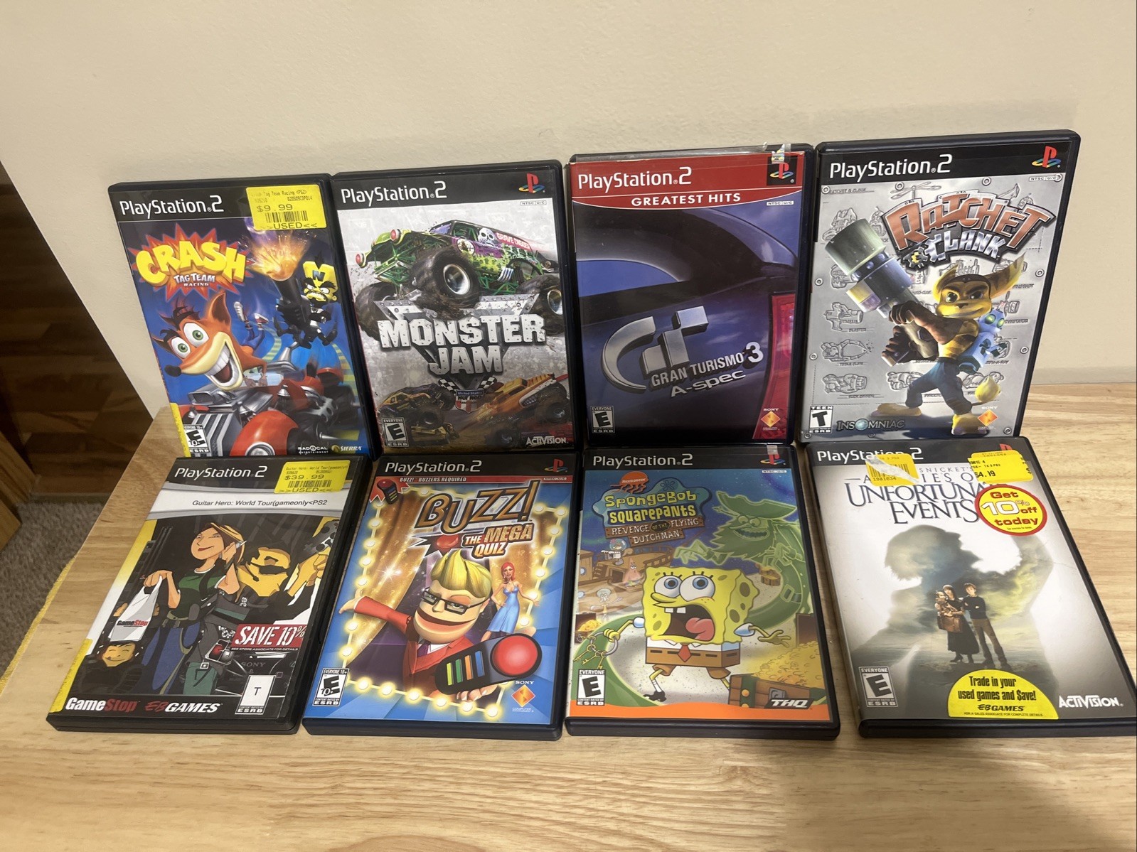 PS2 Game Lot Of 8 PlayStation 2 Crash Ratchet, Gran Turismo 3, Guitar Hero, Etc