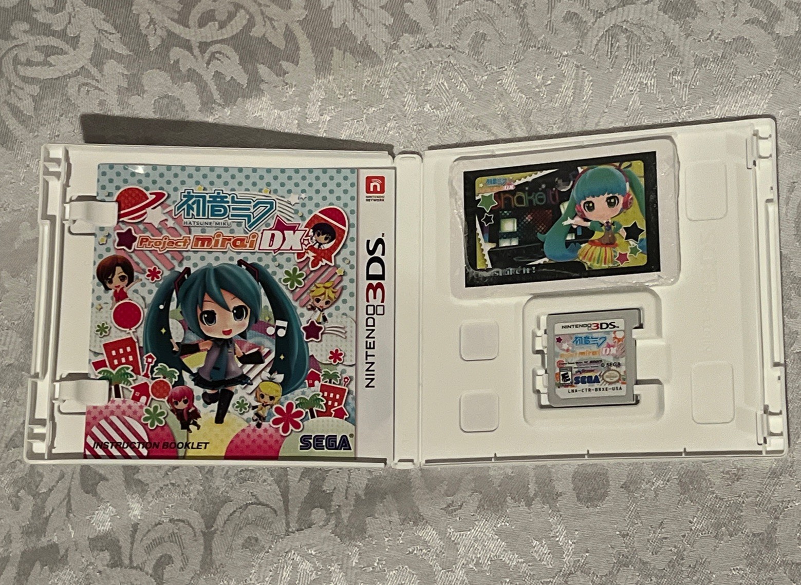 Hatsune Miku: Project Mirai DX (Nintendo 3DS) With Case, UNopened Cards & Manual