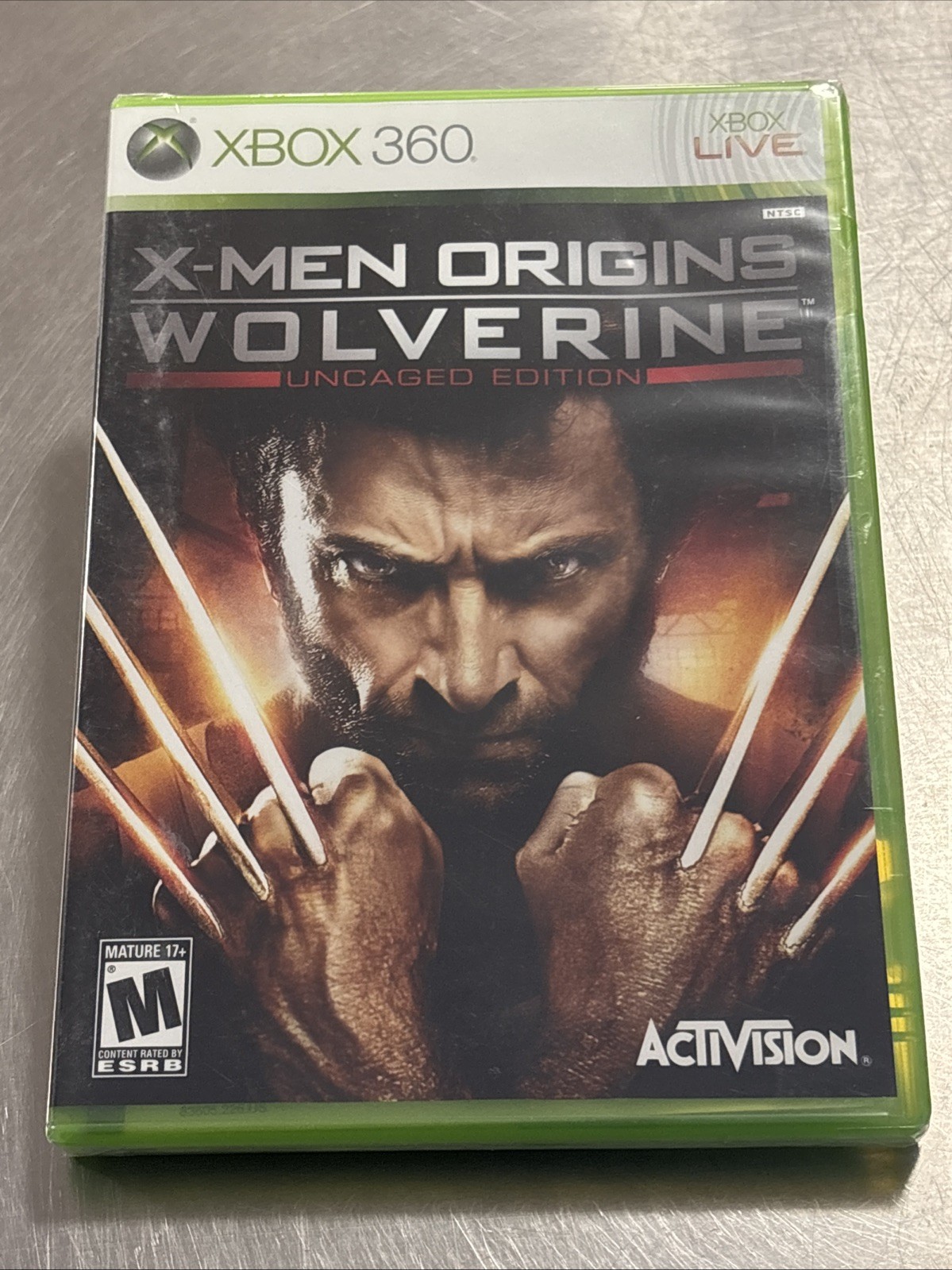 Wolverine X-Men Origins Uncaged Edition (Xbox 360, 2009) new and never opened