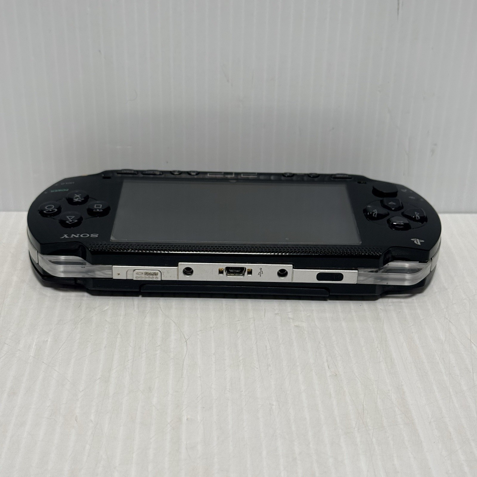 Sony PSP-1001 Black Console With Charger And 32 MB Sony Storage Memory Card