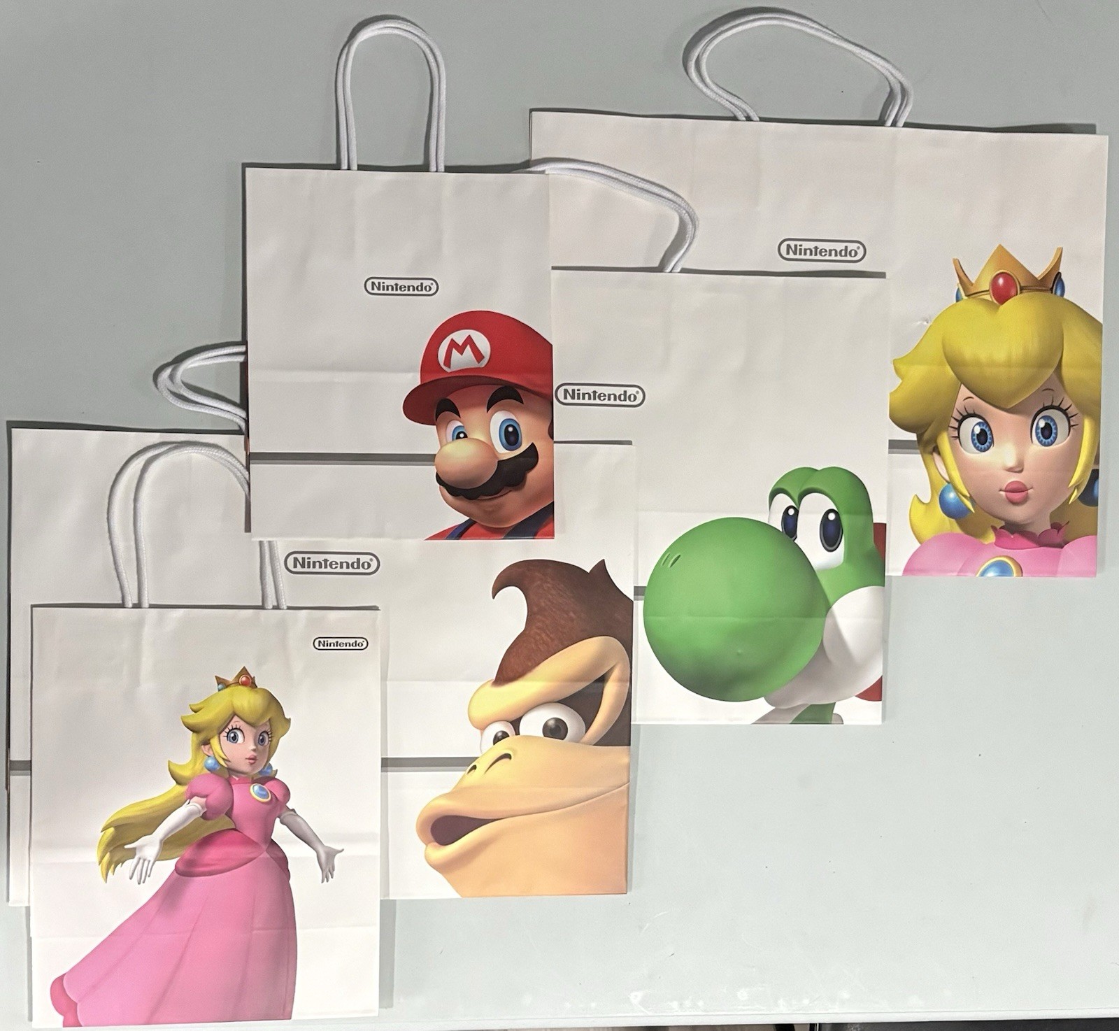 Nintendo Super Mario Bros + DK Yoshi Peach Promotional Gift Bag Lot unused 2009