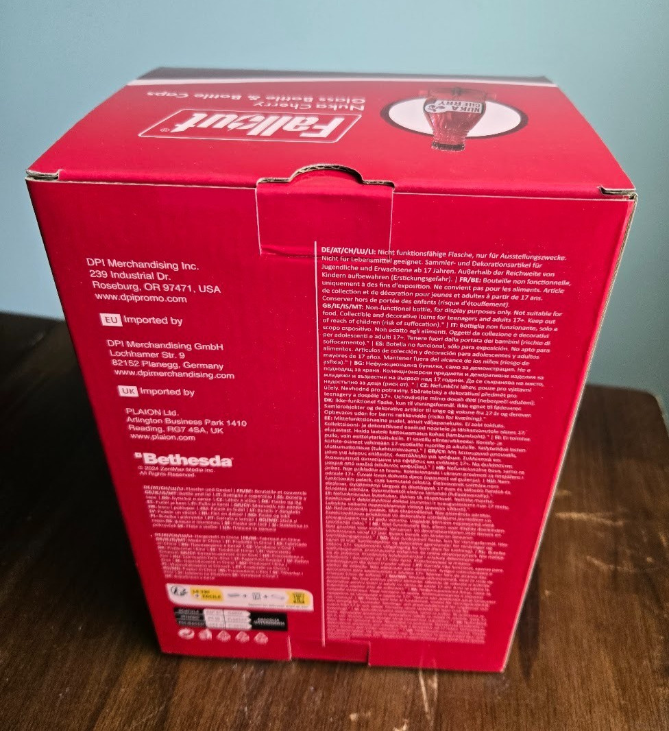 Fallout Nuka Cola Cherry Glass Rocket Bottle & 10 Bottle Caps NEW