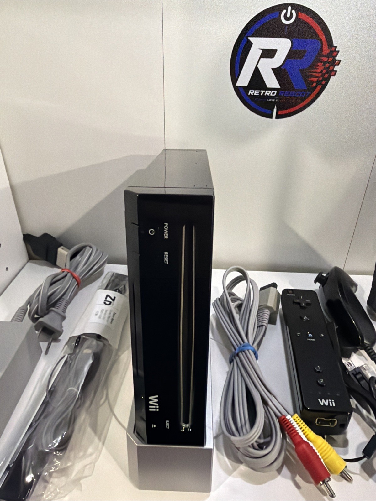 Nintendo Wii RVL-101(USA) Console Bundle – Black (2 Sets Of Controllers & Game)