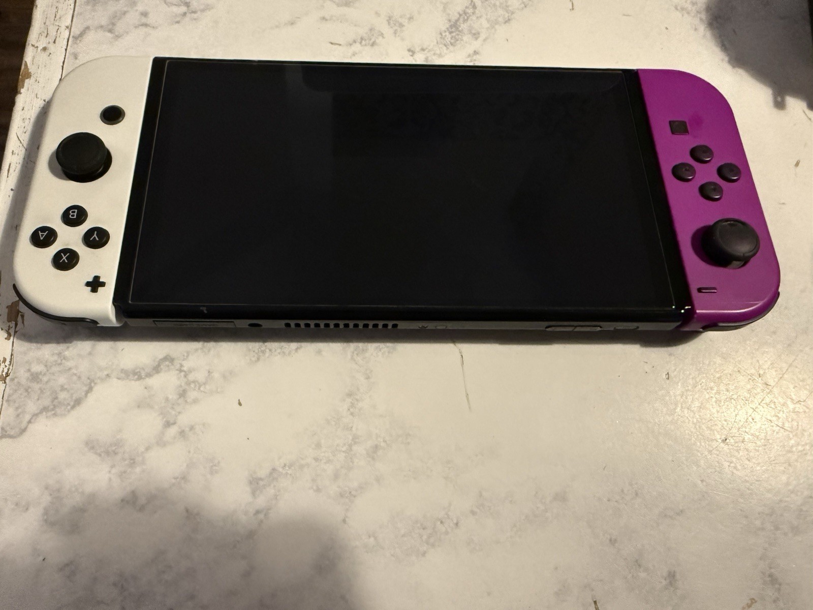 Nintendo Switch OLED – with Extras