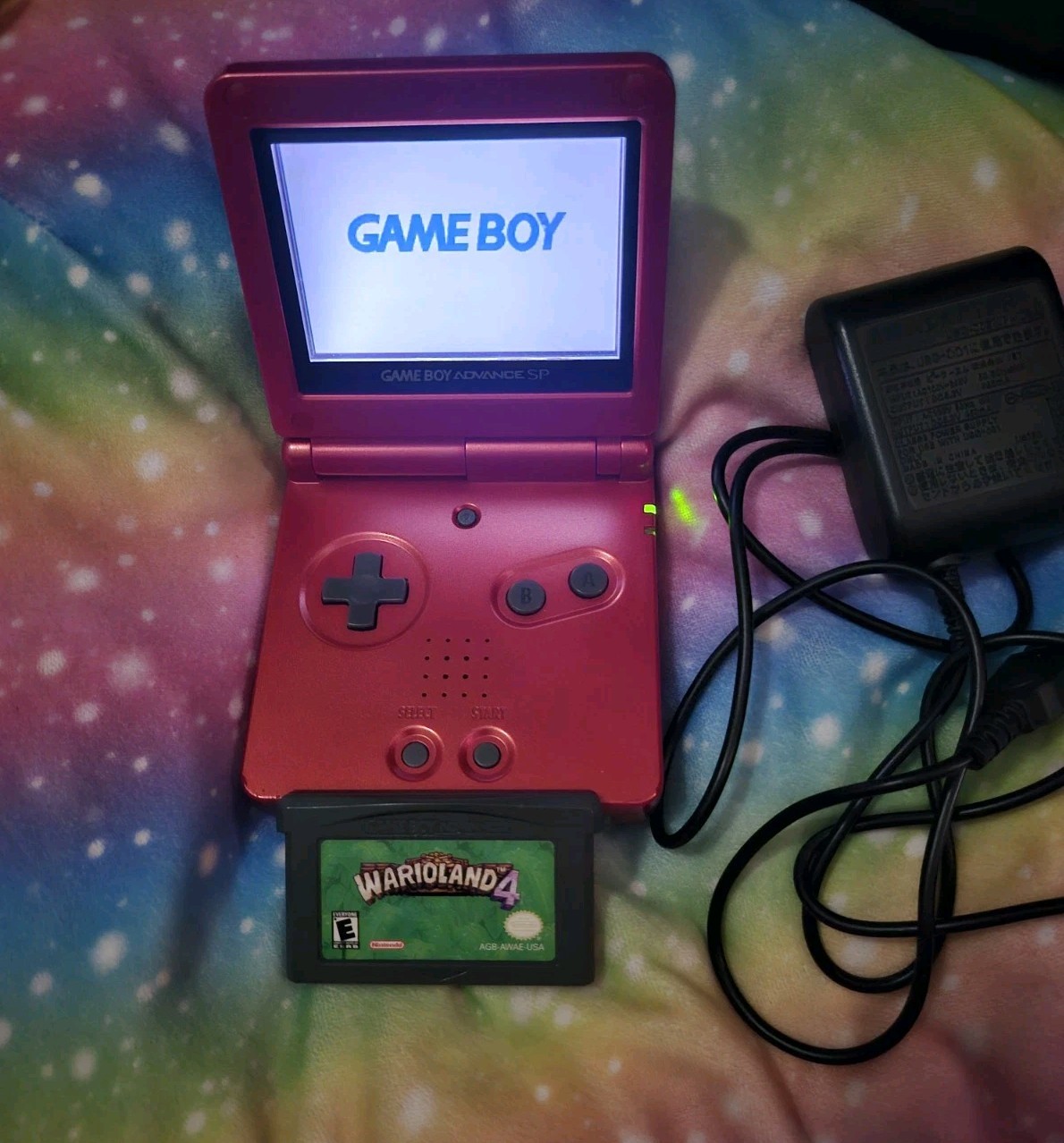 Nintendo Game Boy Advance SP with Charger & 1 Game Warioland 4- Tested Flame Red
