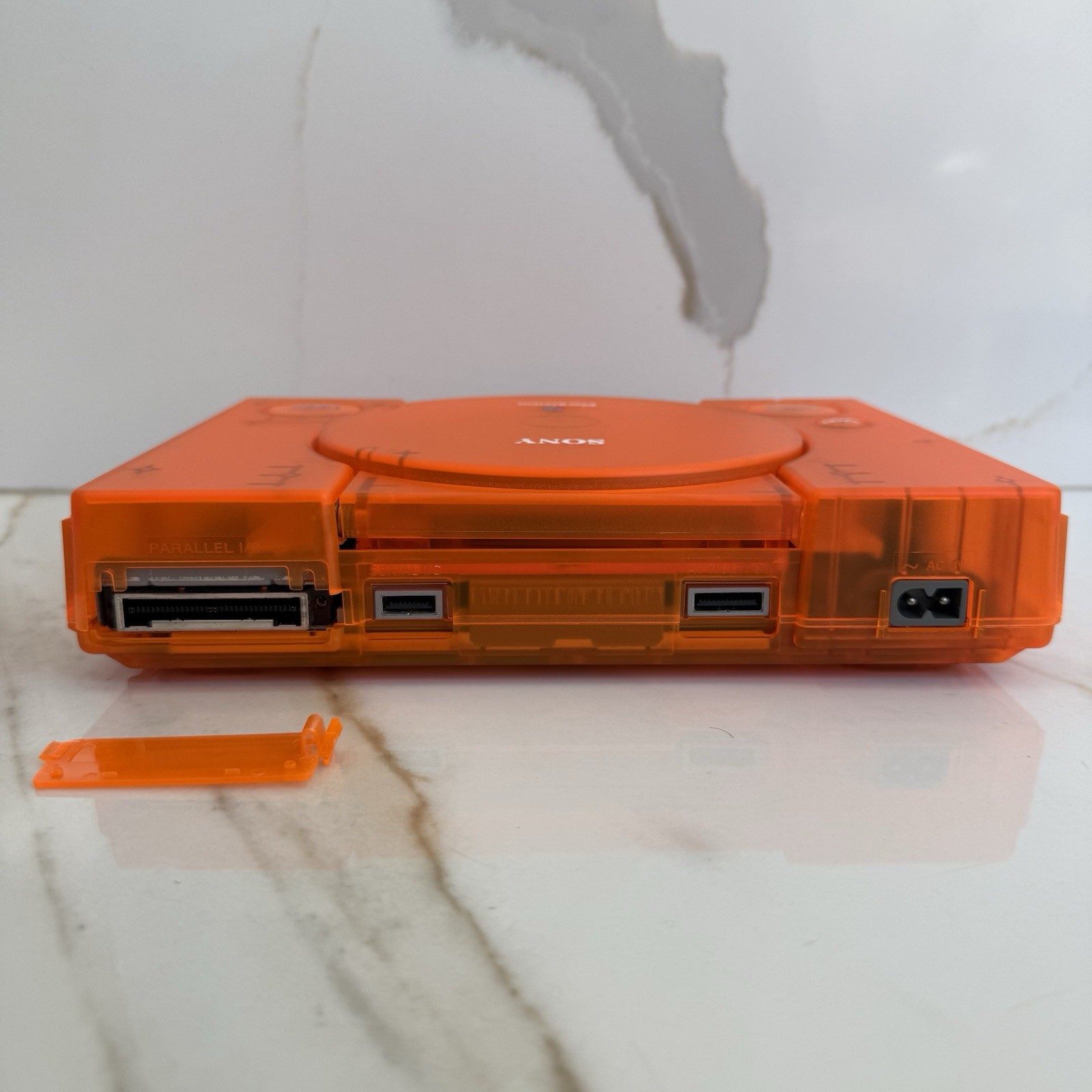 Sony PlayStation 1 Console (SCPH-5501) Bundle – Transparent Orange Clear Shell