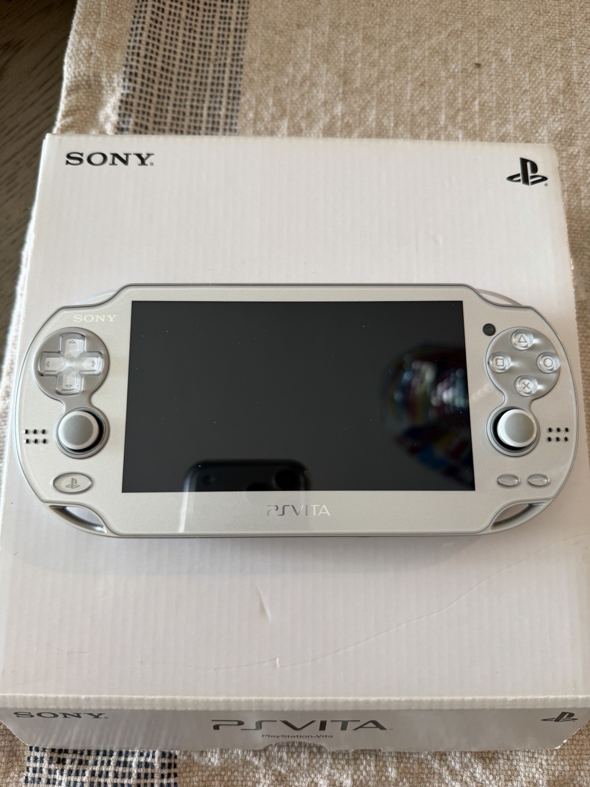 MINT Sony PS Vita PCH-1000 OLED SILVER with box