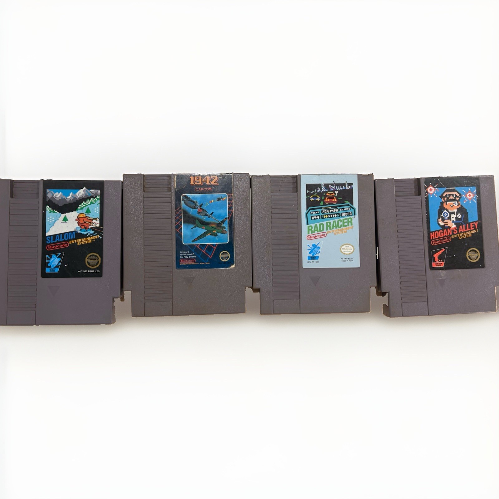 Nintendo NES 4 Game Lot Slalom, Hogans Alley, 1942, Rad Racer Good Condition
