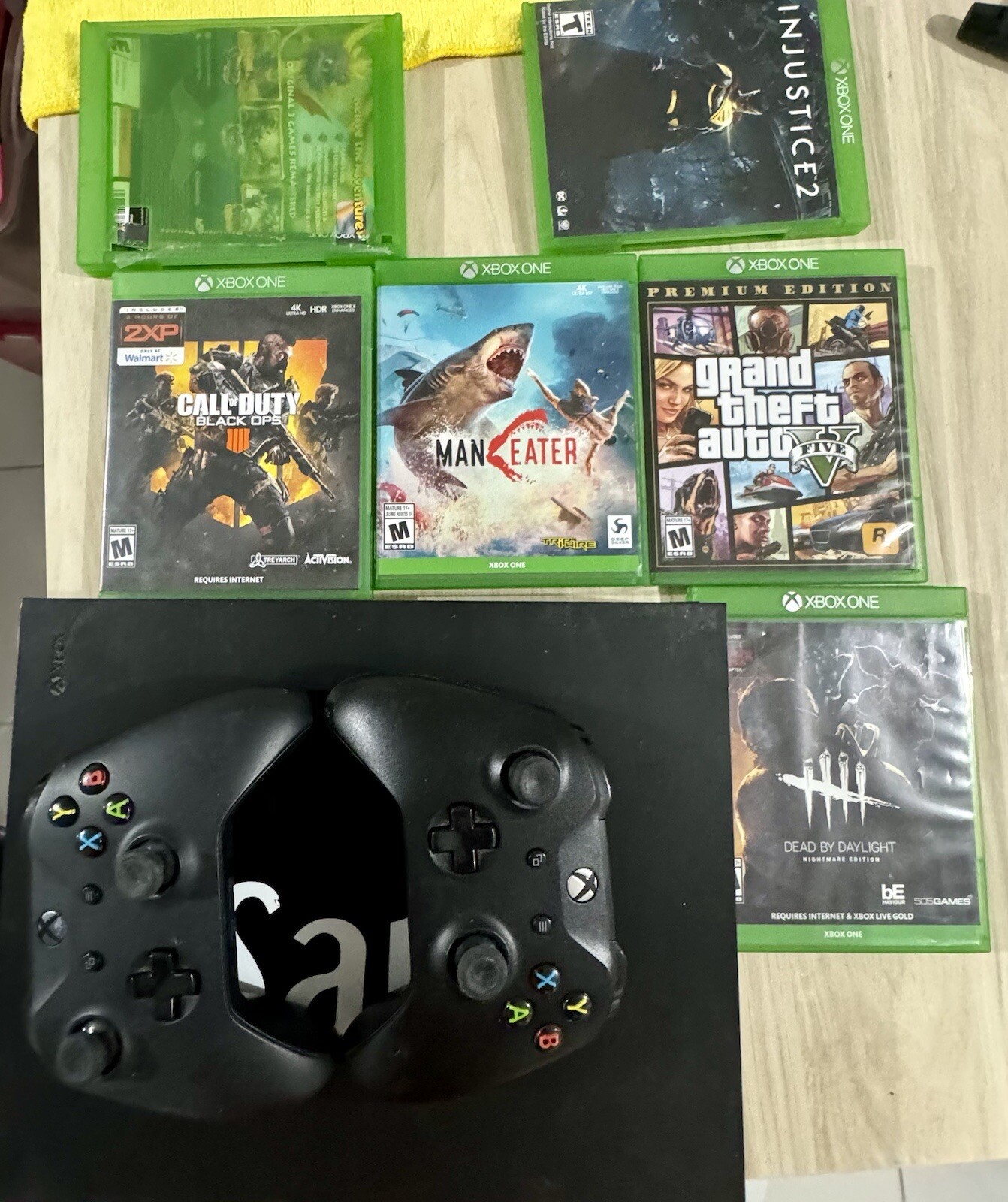 Xbox One X , 6 Games And 2 Controllers