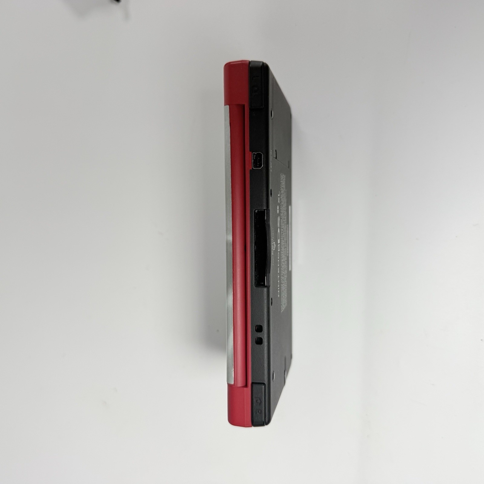 Nintendo DSi XL Red Console w/ Raiders Skin- Stylus + Charger USA Tested