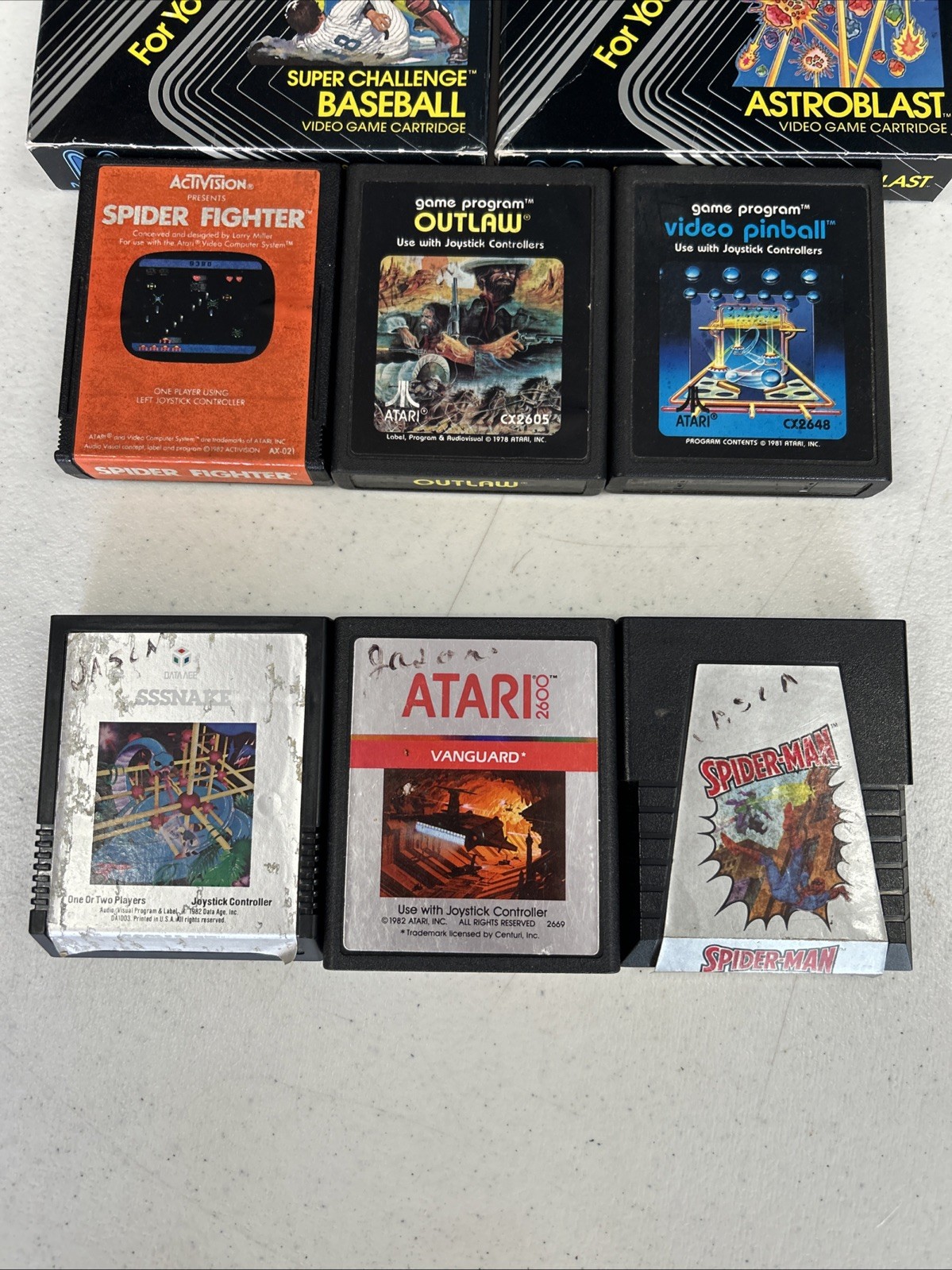 Lot Of 8 Atari 2600 Video Games Vintage Spider-Man Astroblast Sssnake Outlaw