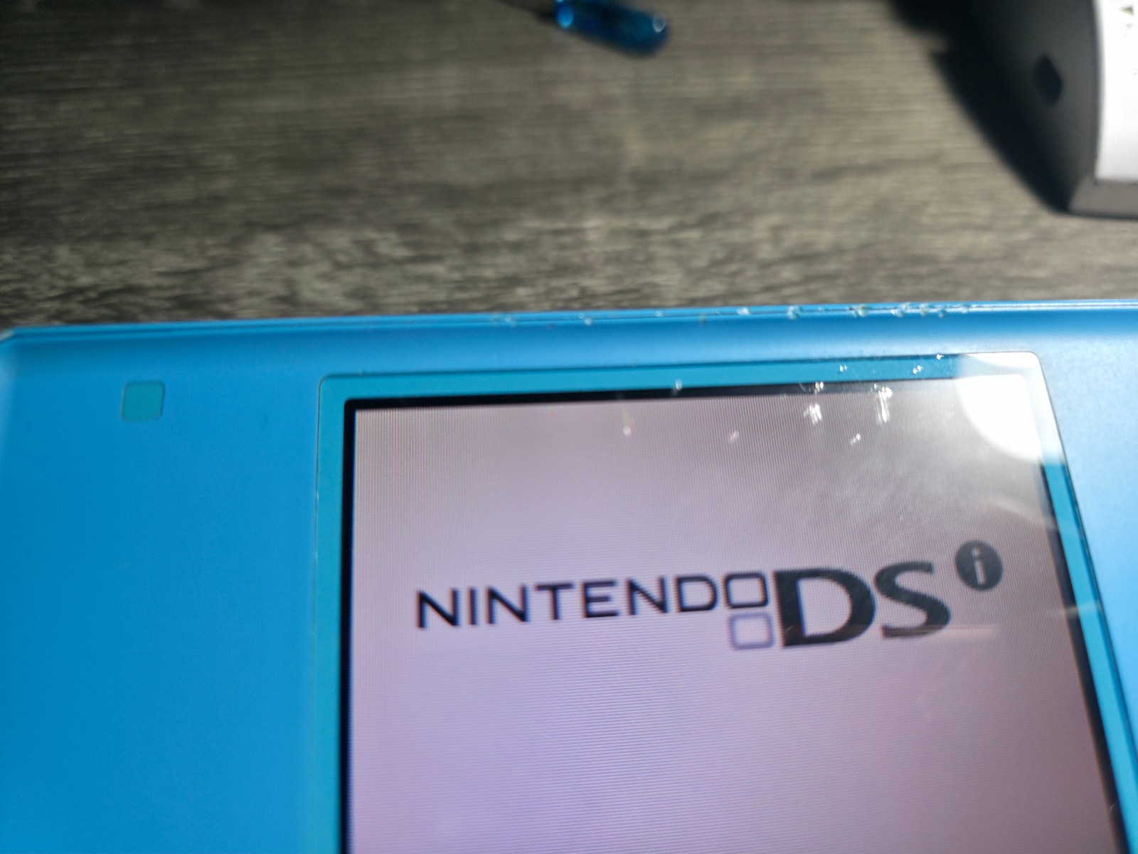 Nintendo DSi Light Blue Handheld Console System Only TESTED (SCREEN SCRATCHES)